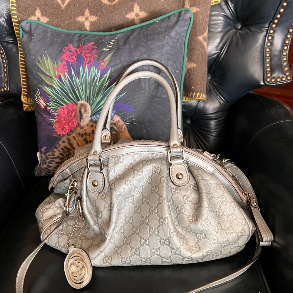 Gucci (TRADE)